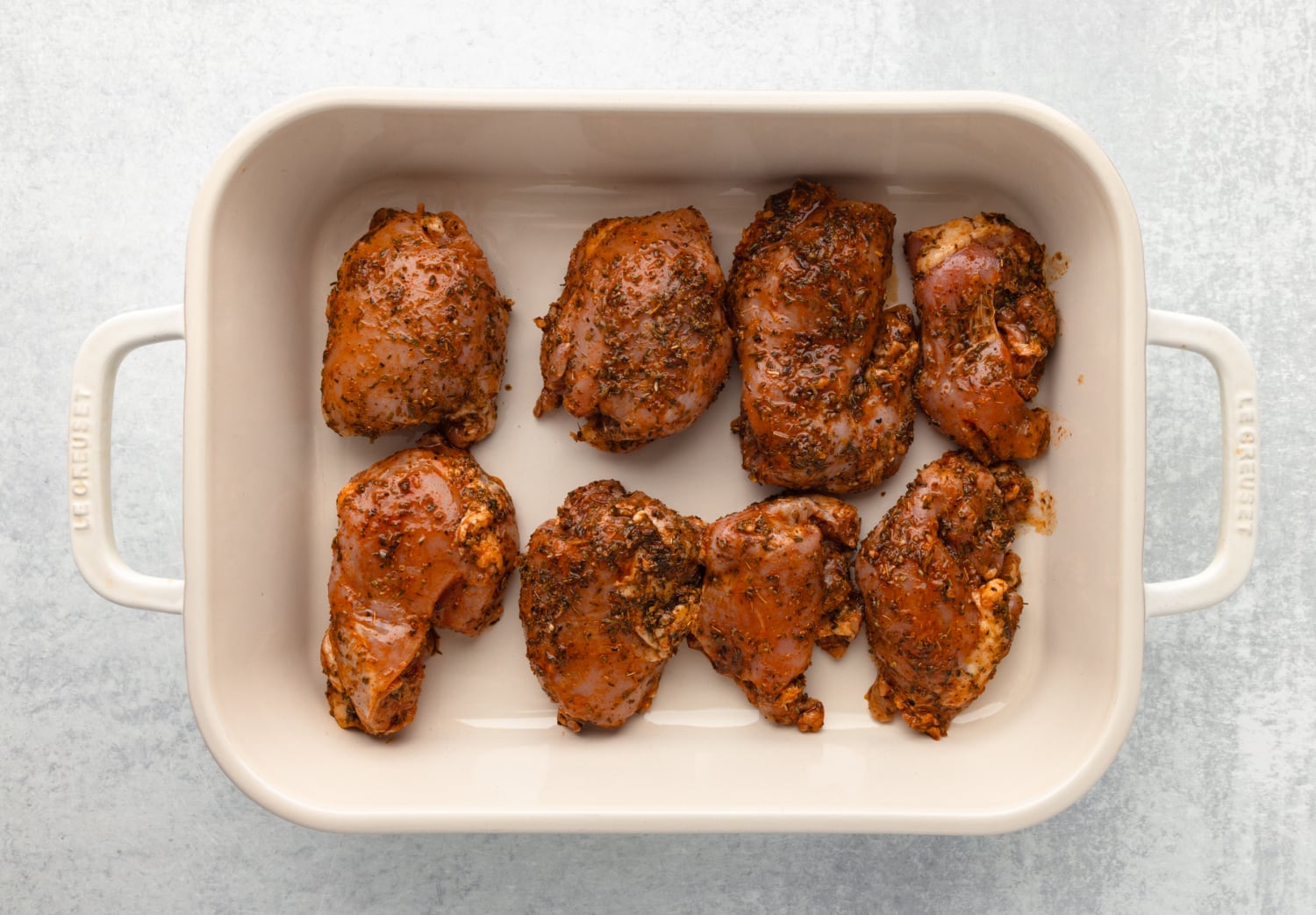marinaded chicken in a baking dish