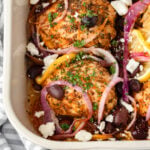 Greek Chicken Thighs in a baking dish