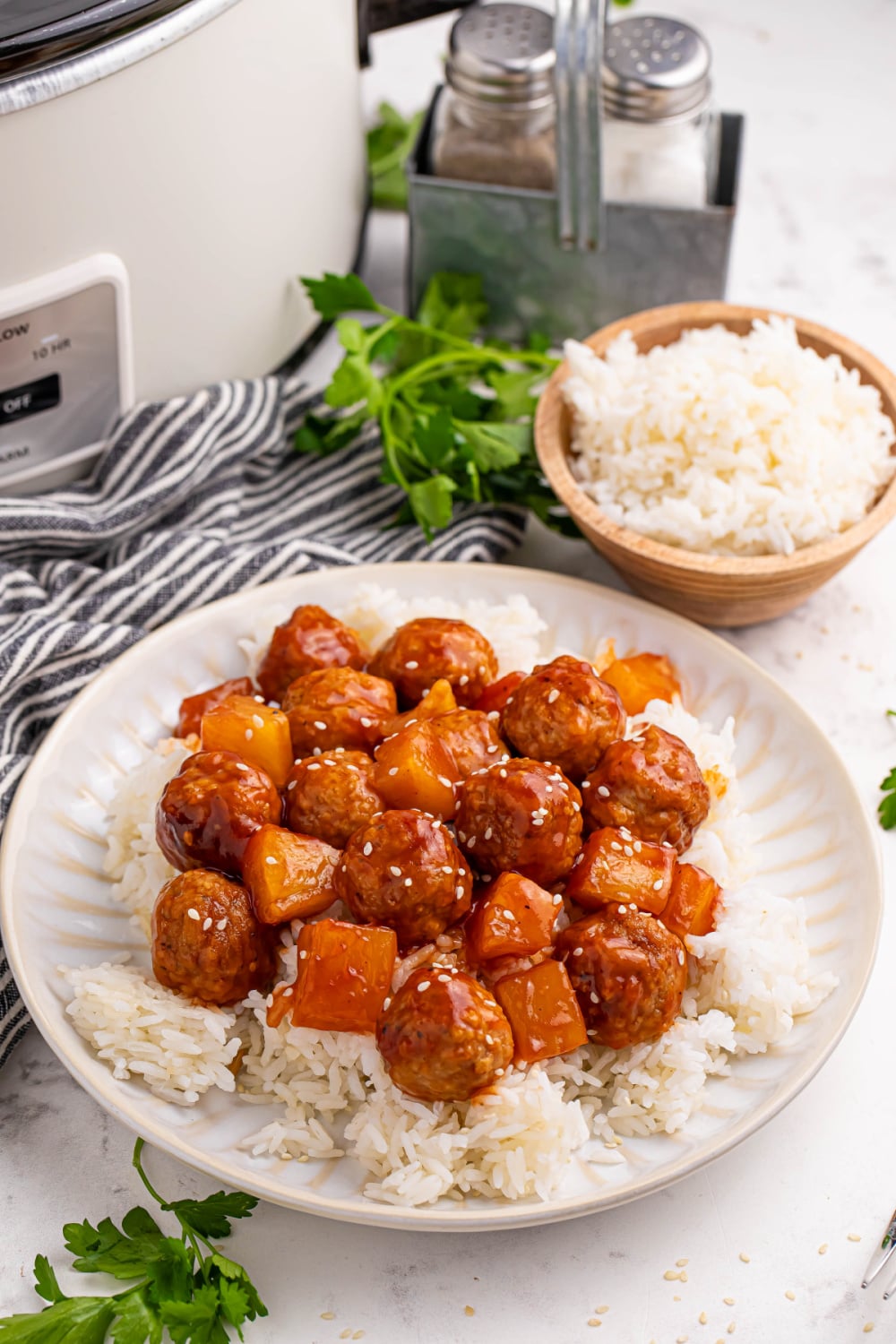 Slow Cooker 3 Ingredient Hawaiian Meatballs served over rice