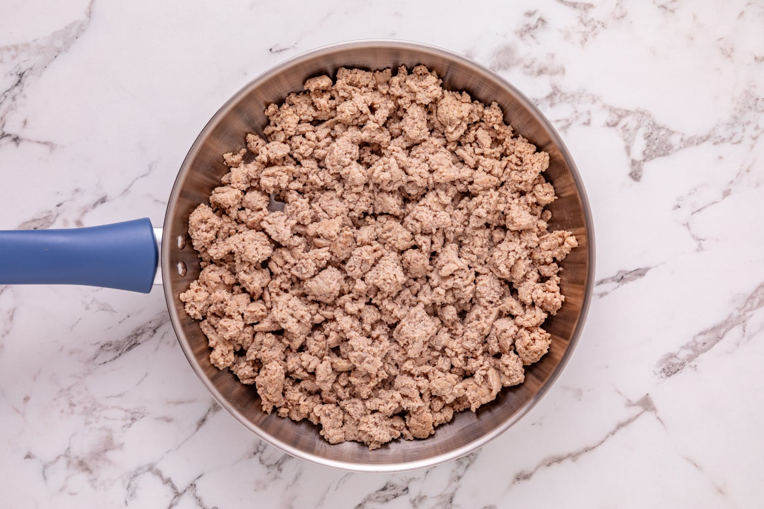 ground turkey cooking in a pan