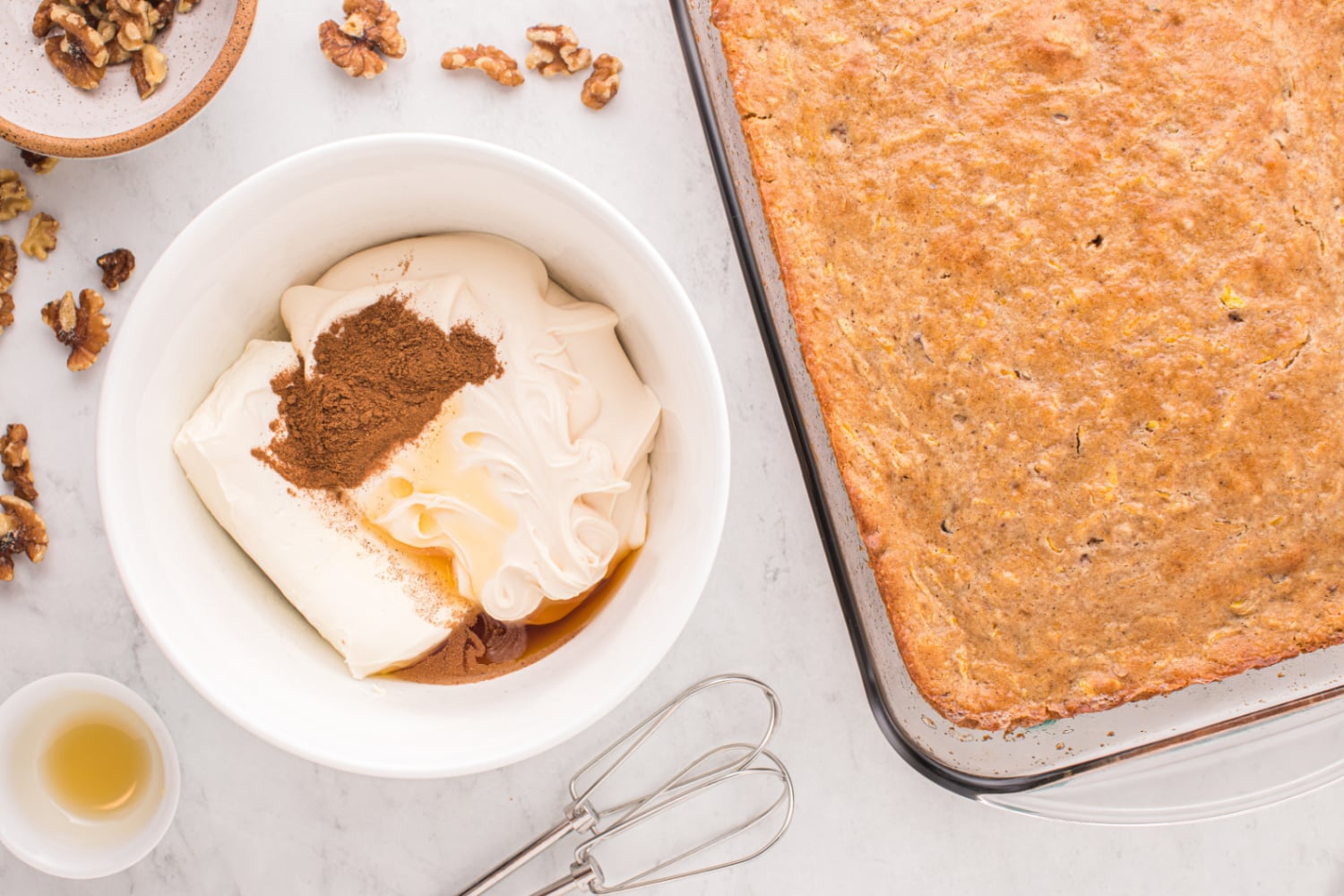 cream cheese frosting, softened cream cheese, maple syrup, and pumpkin pie spice in a bowl