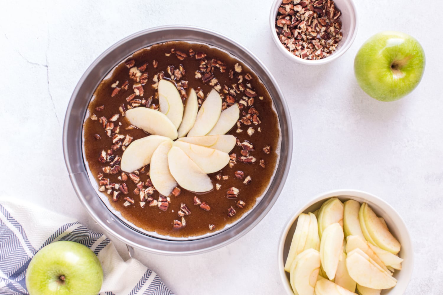 apple slices added on top of caramel