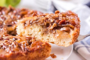 Caramel Apple Upside Down Cake with a slice being taken