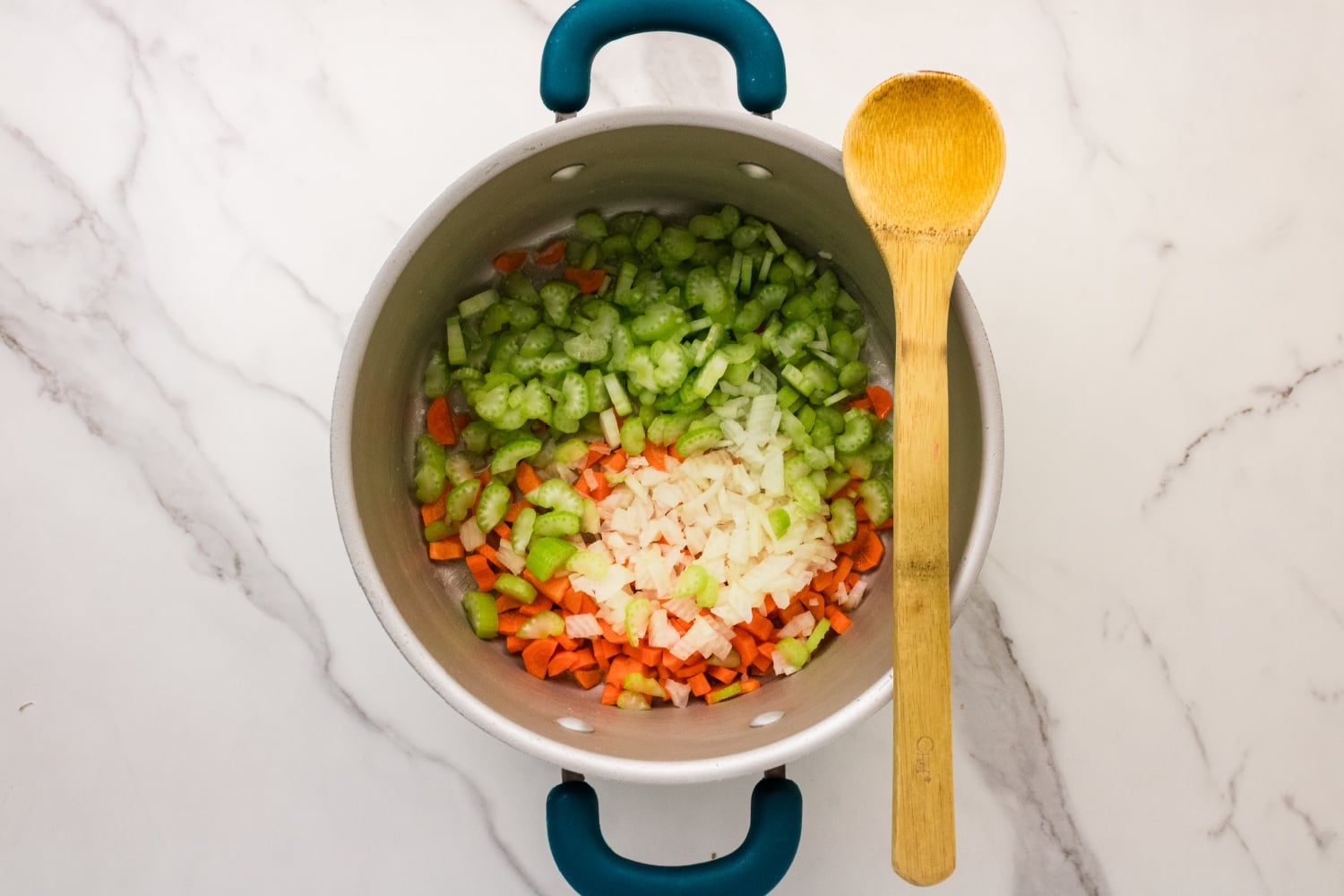 veggies and butter in a soup pot