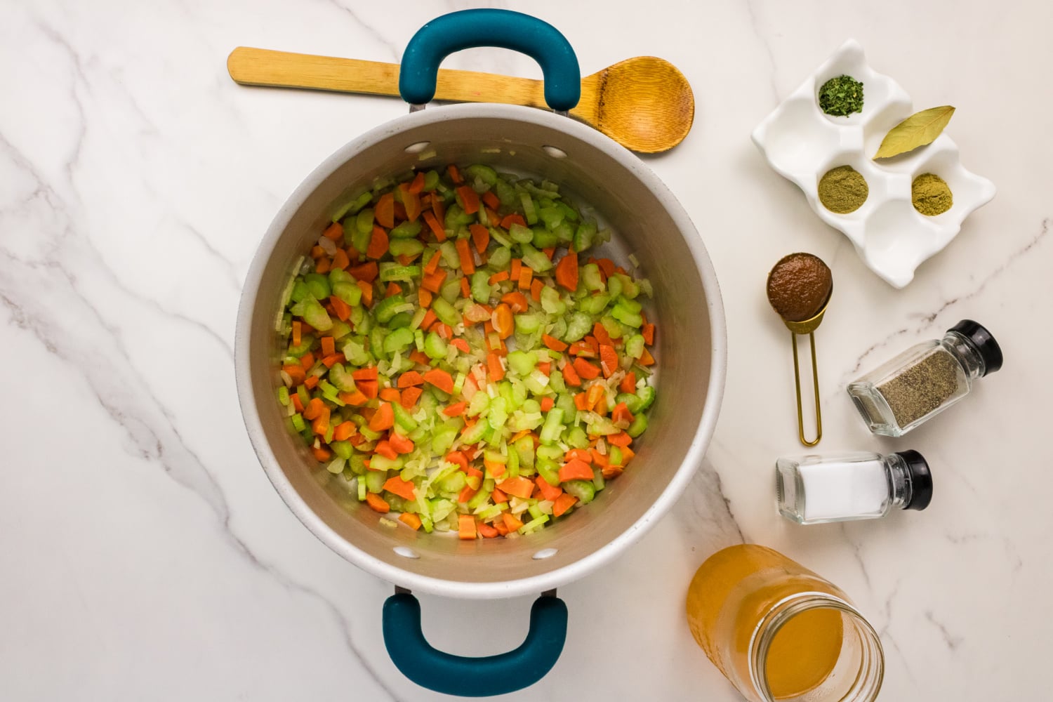 cooked veggies in a soup pot